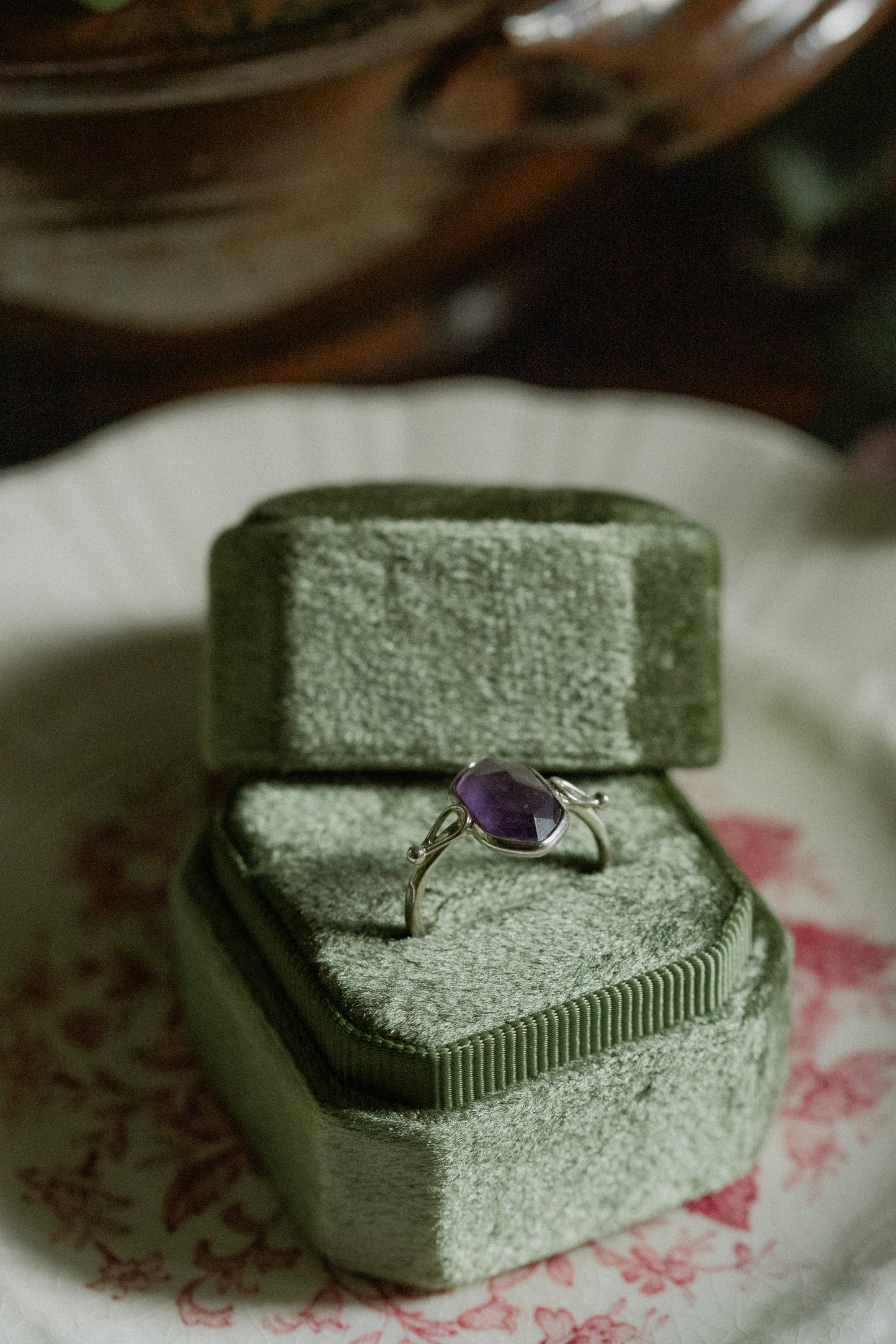 Faceted amethyst stone with a sterling silver band - size 6